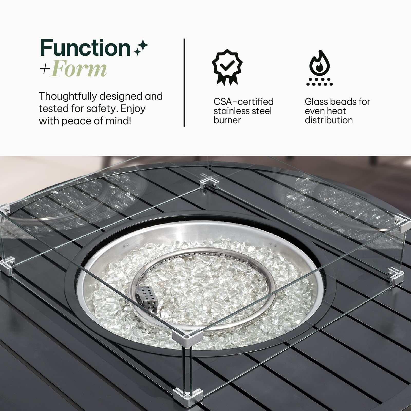 Close-up view of Aluminum Propane 42" Round Outdoor Fire Pit Table showcasing the heat-efficient glass beads and a durable glass windguard to maintain a steady flame, Oakville, ON.