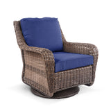 Side corner view of Cambridge Wicker Outdoor Swivel Chair showcasing its 360° swivel base, plush cushions, and all-weather resin wicker design in Oakville, ON.