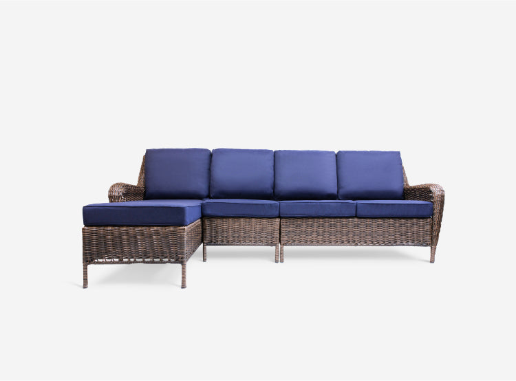 Front view of Cambridge 5-Piece Wicker Outdoor Left Arm Chaise Sectional featuring a left arm chaise, armless middle chair, right arm loveseat, coffee table, and end table with classic all-weather wicker weave and plush weather-resistant cushions, Oakville, ON.
