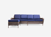 Front view of Cambridge 5-Piece Wicker Outdoor Left Arm Chaise Sectional featuring a left arm chaise, armless middle chair, right arm loveseat, coffee table, and end table with classic all-weather wicker weave and plush weather-resistant cushions, Oakville, ON.