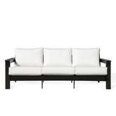 Hickory Polymer Outdoor Loveseat with Sunbrella® Canvas White cushions and black frame, stylish coastal design in Oakville, ON