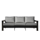 Hickory Polymer Outdoor Loveseat with Sunbrella® Cast Slate cushions and black frame, modern coastal style in Oakville, ON
