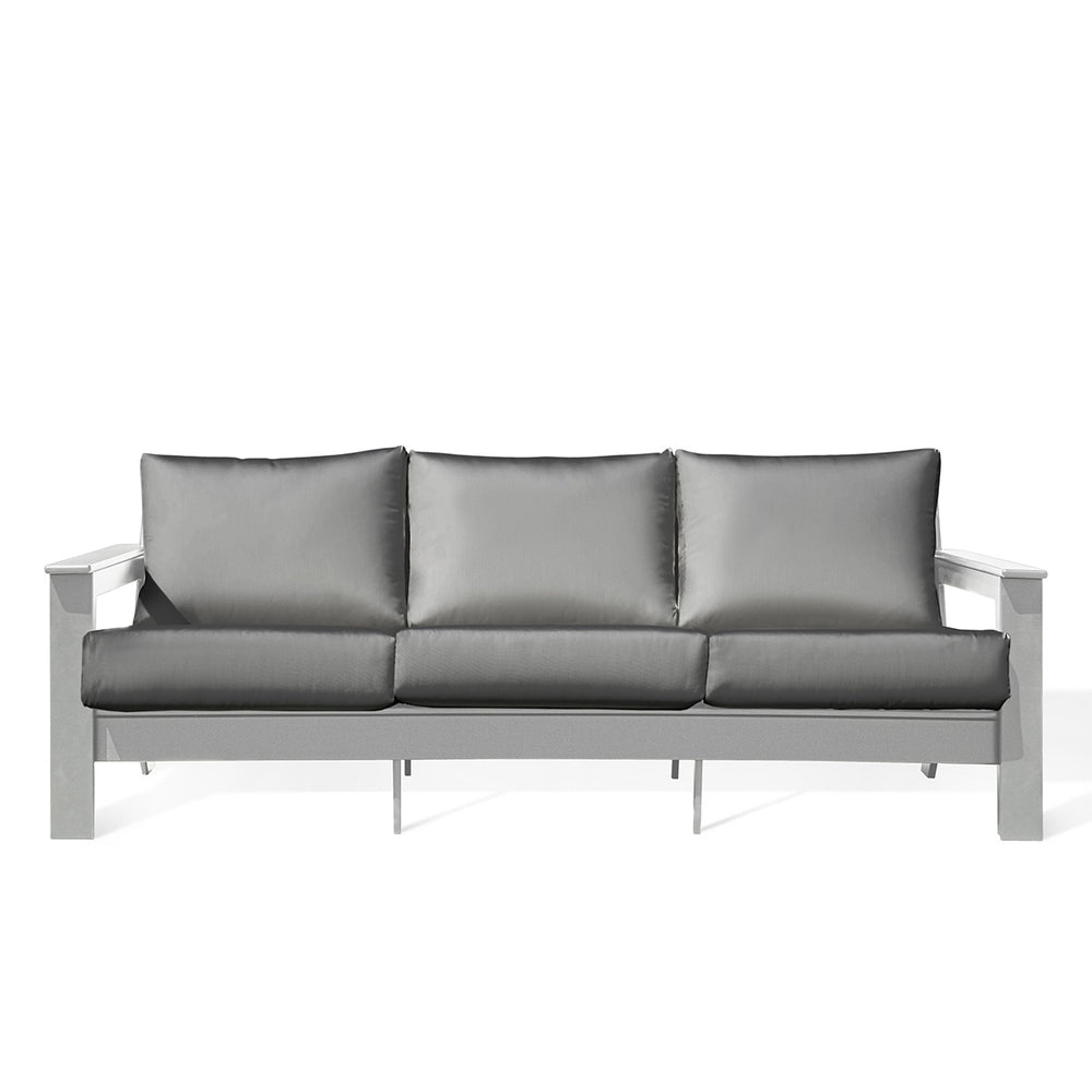 Front view of the Hickory Marine Grade Polymer Outdoor Sofa in white, featuring Sunbrella Cast Slate cushions, perfect for outdoor relaxation, East Credit.