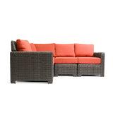 Laguna Point 4-Piece Wicker Outdoor Sectional Set in glossy brown wicker, modular design, vibrant cushions, ideal for Toronto patios.