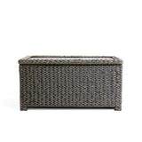 Front view of Laguna Point coffee table with wicker design, tempered glass top, and soft-close hinge for easy storage.