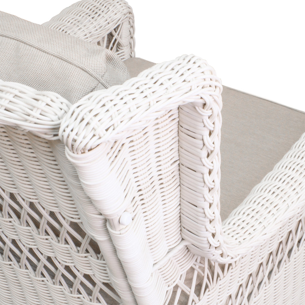 Close-up of Park Meadows Outdoor Chair highlighting the shoulder and detailed weave of the white cream wicker, showcasing fine craftsmanship.