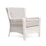 Park Meadows Wicker Outdoor Club Chair shown from right corner side, full view showcasing the white cream finish, diamond weave details, and wide arms. Oakville, ON.