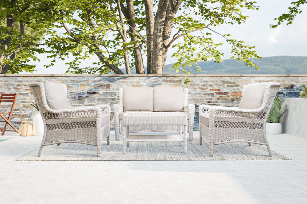 Full Park Meadows outdoor set showcased with half wall, rooftop boundary, trees, and distant mountain view in Oakville.