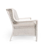 Right side view of Park Meadows Wicker Outdoor Loveseat highlighting cushion depth and wicker detailing, outdoor setting in Oakville, ON.