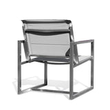 Back view of Pine Stainless Steel & Teak Outdoor Sling Chair: The clean and minimalist back design of the chair, with stainless steel framing and teak wood accents, emphasizing its sleek and durable construction for contemporary outdoor living spaces. Keywords: back view sling chair, teak and stainless steel furniture, modern patio chair.