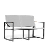 Side angle view of Pine Stainless Steel & Teak Outdoor Sling Loveseat showing a minimalist design with stainless steel framing, teak accents, and ergonomic seating, Oakville, ON.