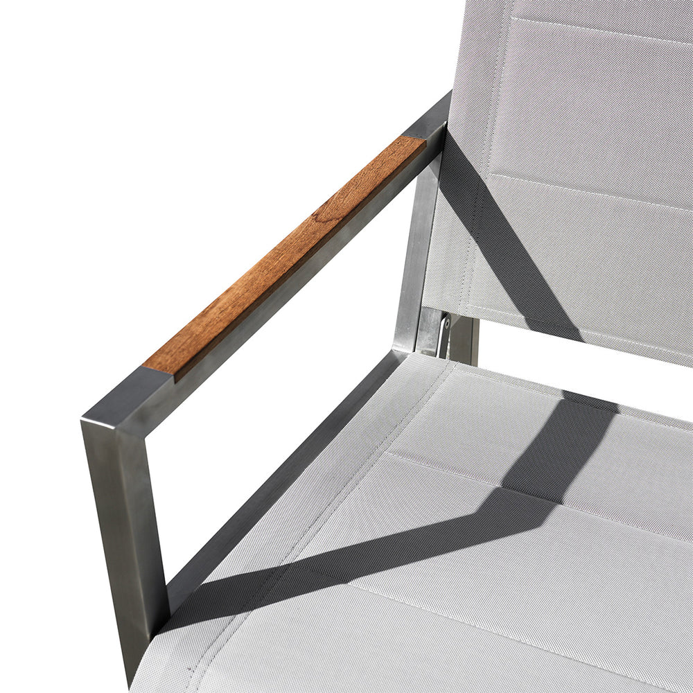 Back view of Pine Stainless Steel & Teak Outdoor Sling Chair showcasing a minimalist stainless steel frame with teak wood accents, Oakville, ON.