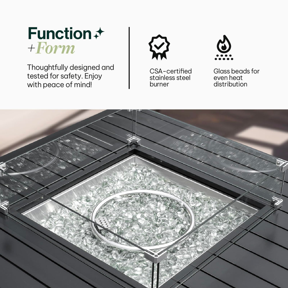 Close-up view of the Aluminum Propane 42" Square Outdoor Fire Pit Table focusing on the heat-efficient glass beads and sturdy glass windguard for a steady, reliable flame, Oakville, ON.