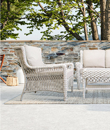 Angled view of Park Meadows 4-Piece Wicker Outdoor Conversational Set highlighting its robust all-weather resin wicker weave and roomy, deep seating for ultimate comfort, Oakville, ON.